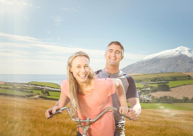 Digital composite of Happy couple with the bike near the village