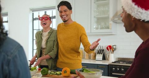 Friends Celebrating Together Preparing Festive Meal