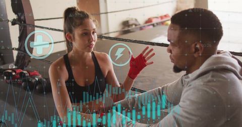 Athletes Analyzing Data in Boxing Ring with Technological Overlay