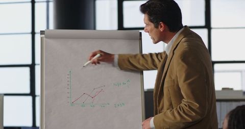 Professional Discussing Financial Growth Strategy in Office - Download Free Stock Images Pikwizard.com