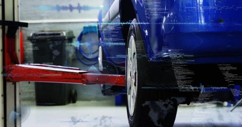 Lifting blue car on red hydraulic hoist showcasing rear wheel and digital diagnostics overlay