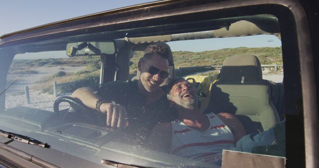 Two Friends Enjoying Road Trip Relaxing in Car at Seaside - Download Free Stock Images Pikwizard.com