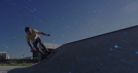 Man Skateboarding on Ramp under Sparkling Night Sky