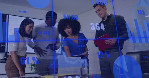 Diverse Team Collaborates on Digital Data Analysis in Modern Office