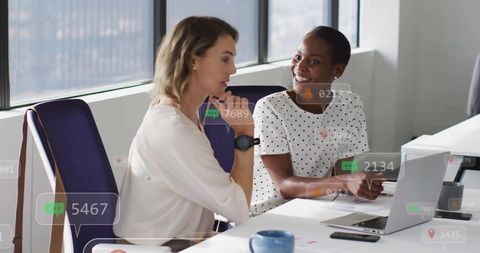 Coworkers Collaborating in Modern Office with Digital Interaction Overlays