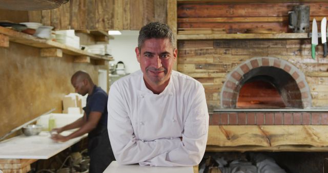 Professional Chef Smiling in Rustic Restaurant Kitchen - Download Free Stock Images Pikwizard.com