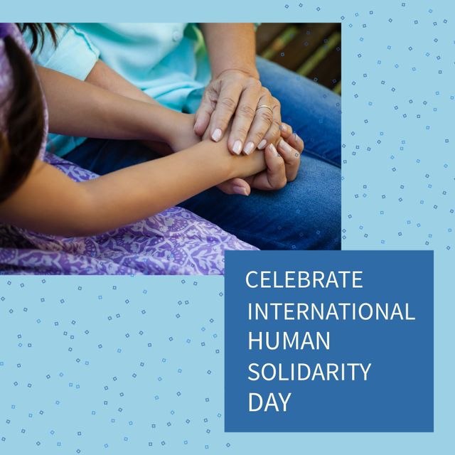 Image of two individuals holding hands, symbolizing support and compassion. Can be used for articles, social media posts, newsletters, and websites promoting International Human Solidarity Day, unity, empathy, and community support. Ideal for conveying messages of togetherness and human connection.