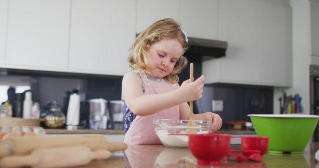 Young Girl Baking in Modern Kitchen - Download Free Stock Images Pikwizard.com