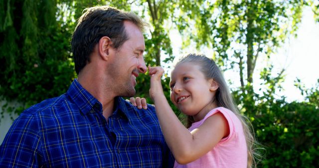 Father and Daughter Smiling and Playing Outdoors - Download Free Stock Images Pikwizard.com