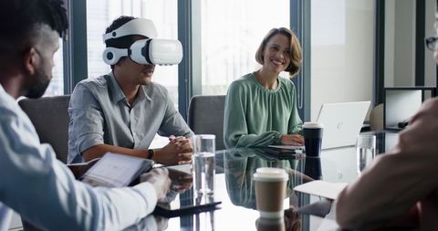 Business meeting with virtual reality technology in modern office