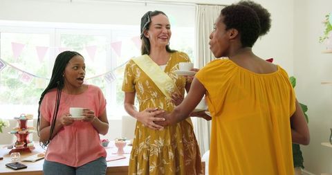 Joyful Friends Celebrating with Selfie at Home Gathering