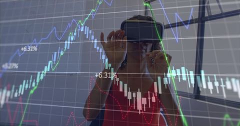 Woman Uses VR Headset with Financial Data Overlay for Business Analysis