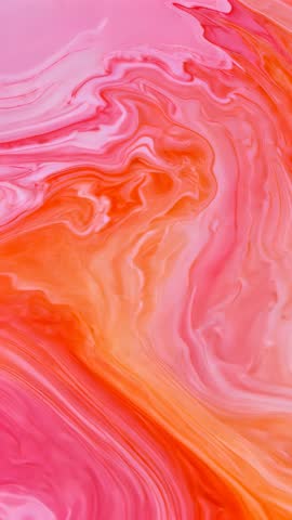 Vertical abstract fluid swirl flowing in vibrant pink and orange for motion background