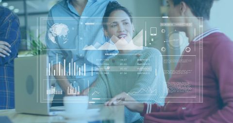 Colleagues Collaborating with Digital Data Interface in Office