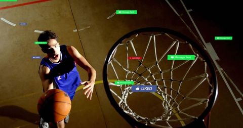 Dynamic basketball player in mid-action under hoop