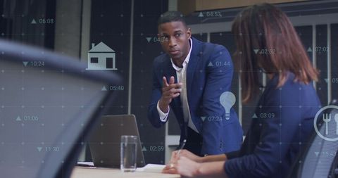 Innovative Team Discussing Data with Technology Overlay