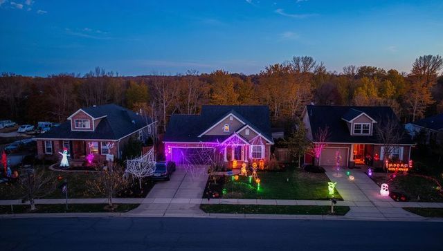 Suburban Houses Illuminated with Festive Halloween Decorations