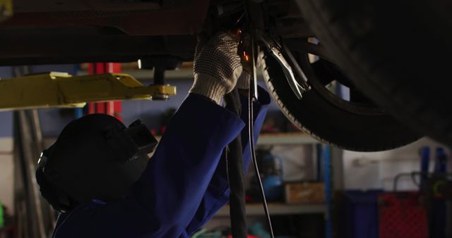 Image of caucasian female car mechanic welding car - Download Free Stock Photos Pikwizard.com