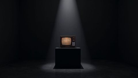 Nostalgic Vintage TV with Flickering Static in Moody Gallery