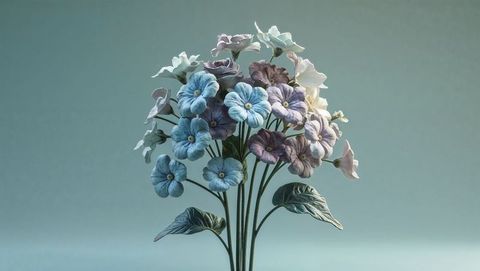 Bouquet of pastel forget me not flowers on green stems against blue background