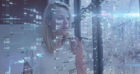 Businesswoman Interacting with Smartphone Amidst Lit Data Streams