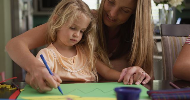 Mother Helping Daughter with Art Project at Home - Download Free Stock Images Pikwizard.com