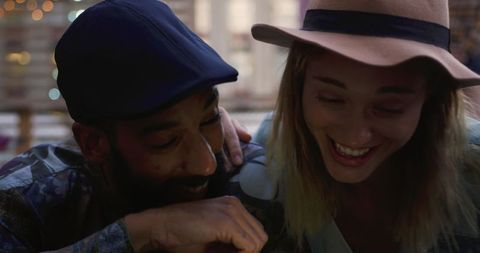 Happy friends taking selfie at rooftop party