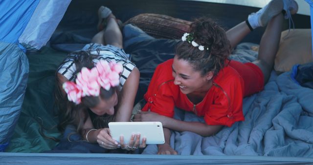 Happy Friends Relaxing in Tent Using Digital Tablet - Download Free Stock Images Pikwizard.com