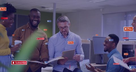 Diverse Colleagues in Office with Social Media Icons