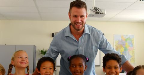 Smiling Teacher with Diverse Classroom Students - Download Free Stock Images Pikwizard.com