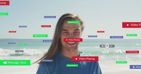 Smiling adult man standing at beach shore surrounded by floating social media notifications
