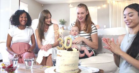 30th Birthday Celebration with Friends and Baby in Bright Living Room