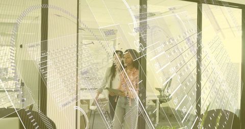 Women Viewing Digital Projections in Corporate Corridor