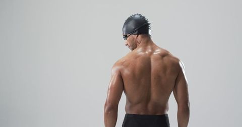 Determined Swimmer Poised Before Race, Confidence and Focus - Download Free Stock Images Pikwizard.com