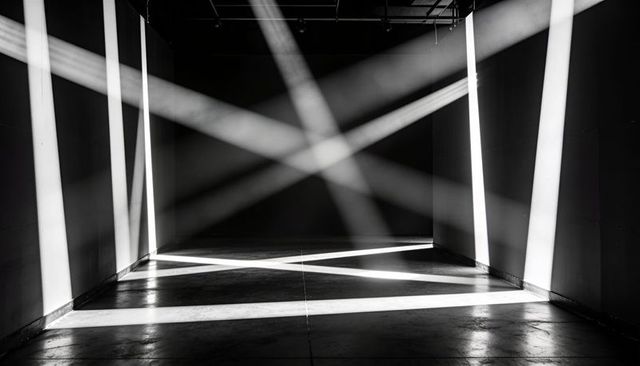 Intersecting light beams in minimal industrial gallery with high contrast geometry