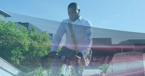 Eco-Conscious Businessman Biking Through Urban Landscape with Light Trails