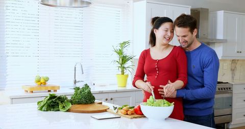 Couple Preparing Salad Smiling in Modern Kitchen - Download Free Stock Images Pikwizard.com