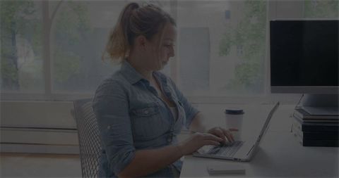 Female Freelancer Working from Bright Home Office