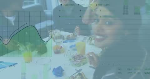 Coworkers Enjoying Lunch with Overlaying Business Graphs