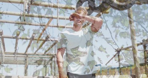 Man training at outdoor obstacle course