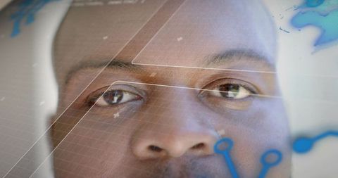 Closeup pilot wearing white helmet viewing augmented reality hud interface