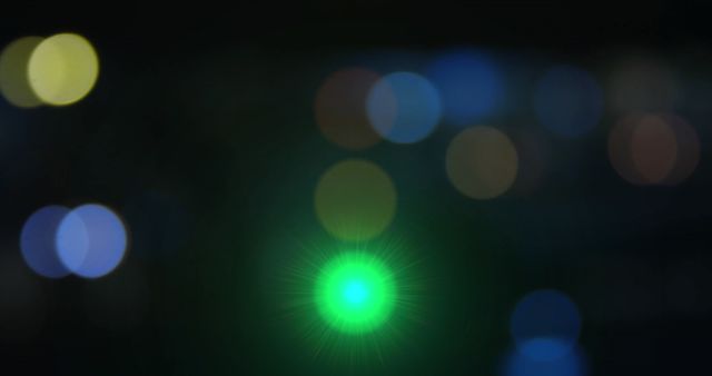 Blurry City Lights with Green Traffic Light Beam at Night - Download Free Stock Images Pikwizard.com