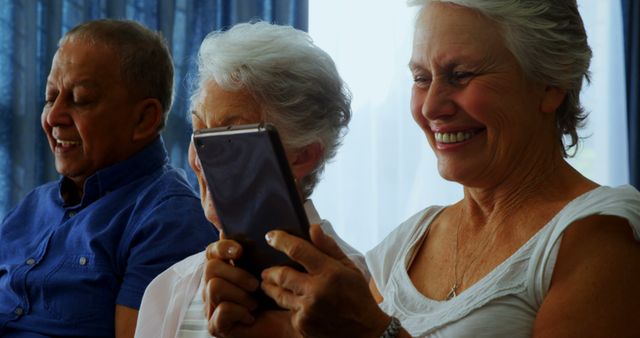 Senior Friends Enjoying Video Call Together - Download Free Stock Images Pikwizard.com