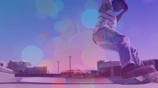 Visually dynamic scene showing a young man actively skateboarding in an urban environment with a vibrant and colorful bokeh effect overlay. Suitable for promoting sports events, digital designs, or lifestyle content, emphasizing energy and youthfulness.