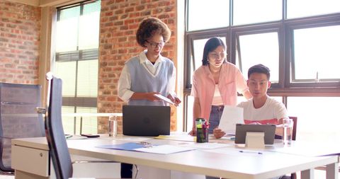 Team Collaboration Meeting in Sunny Modern Office