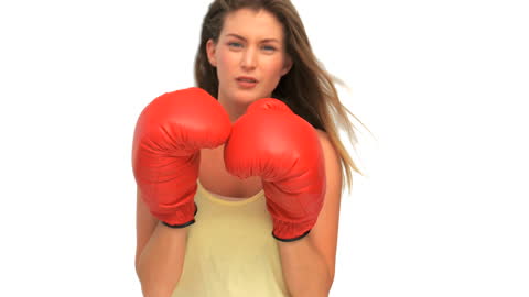 Active Woman Boxing with Red Gloves in Action Pose