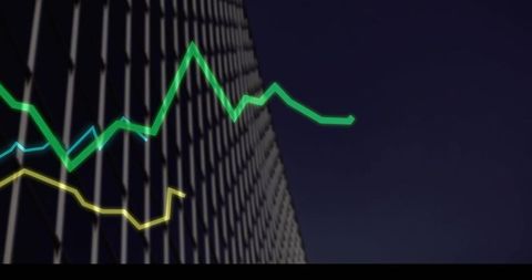 Neon line graphs overlaying office facade grid at night business data visualization
