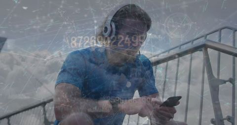 Athletic Man Using Smartphone with Futuristic Digital Interfaces