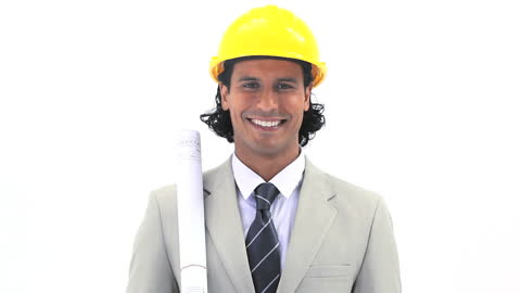 Confident Engineer Smiling with Blueprints in Hand