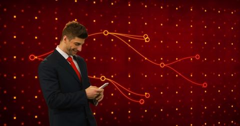 Businessman Engaging with Smartphone over Digital Data Background